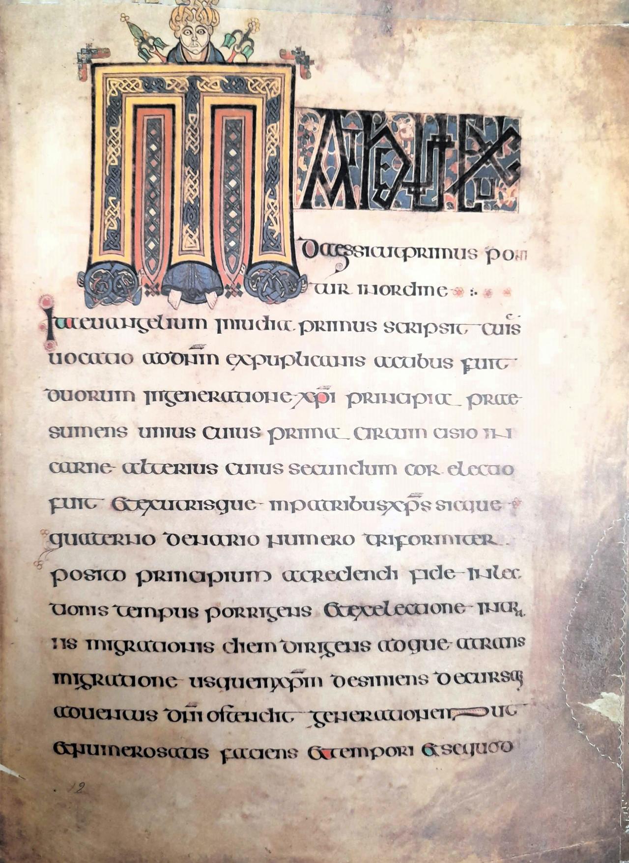 A decorative letter M from the Book of Kells.