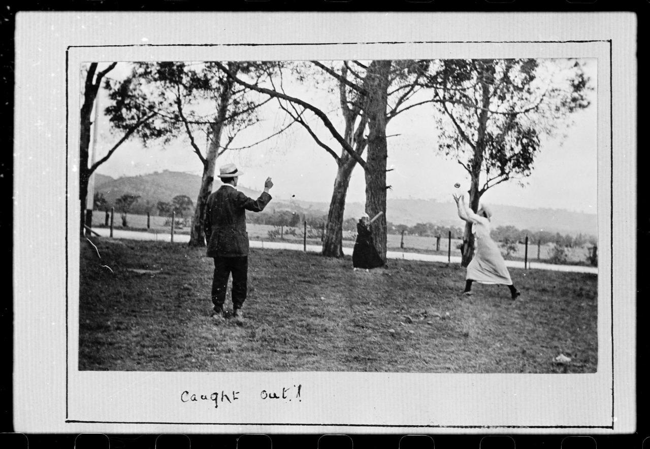 Two women playing cricket with an umpire, 1920. SLSA: B 52749 