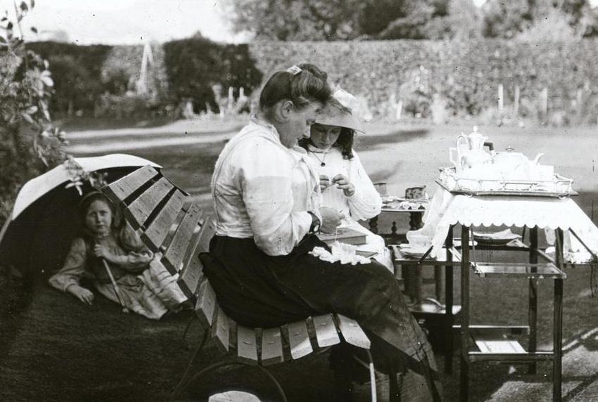 Woman and children in the garden. Photo taken my WC Brokker. SLSA: PRG 1316/3/257