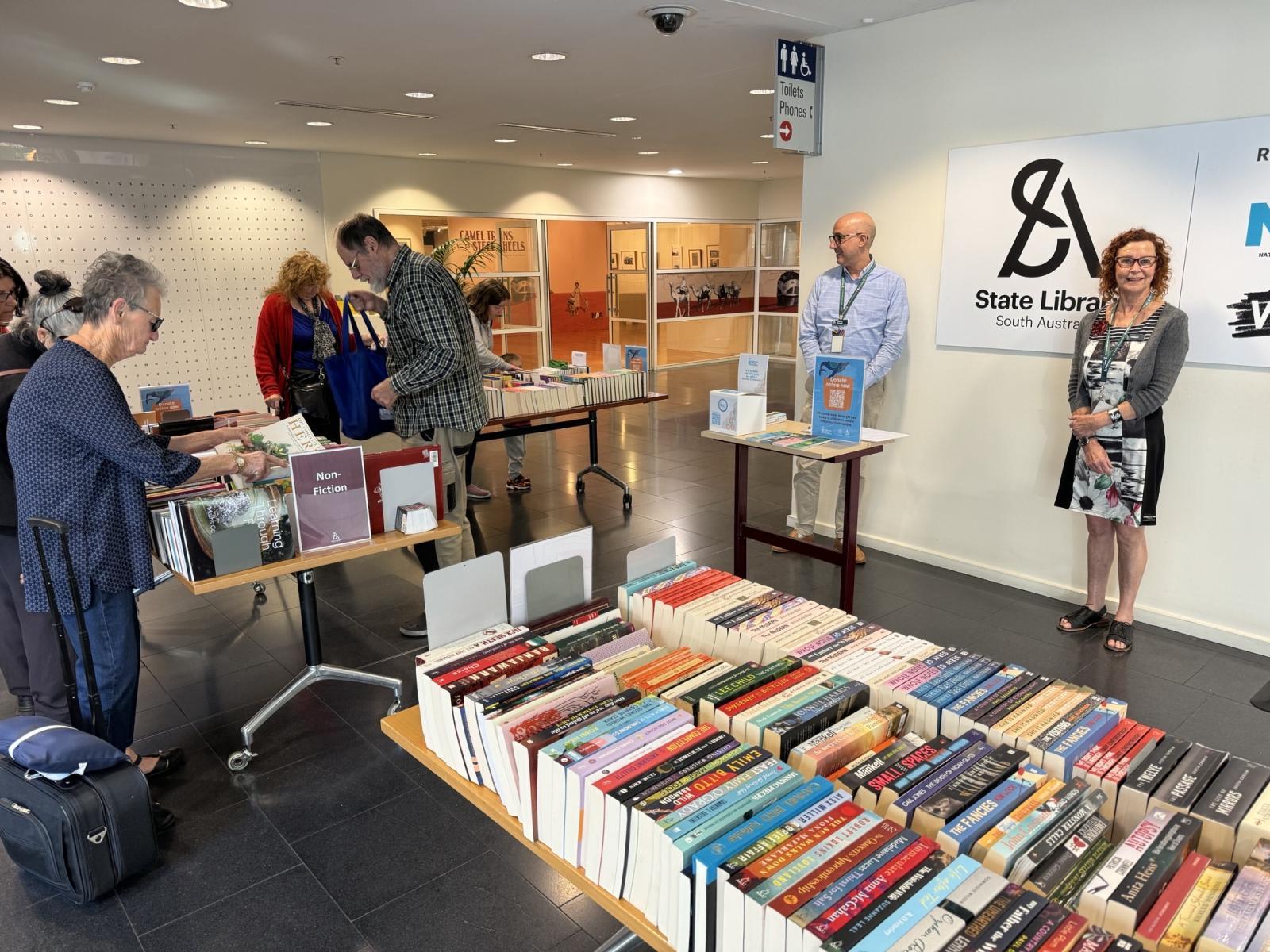 People browsing a book stall