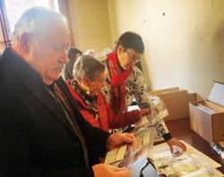 Looking at the display of published and archival material.