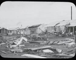 Tornado damage at Barmera showing row of damaged houses-c 1924