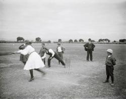 Girls and boys playing cricket-Alberton Oval with girl batting-c1920 to 1926