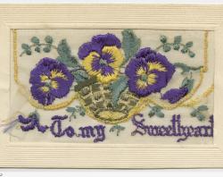 Silk-embroidered WW1 postcard of purple and yellow pansies and words 'To my sweetheart'  