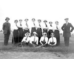 Members of a women's cricket team in South Australia with two men, possibly coaches or umpires, 1915. SLSA: PRG 280/1/10/246 