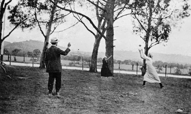 wo women playing cricket with an umpire, 1920.  SLSA: B 52749