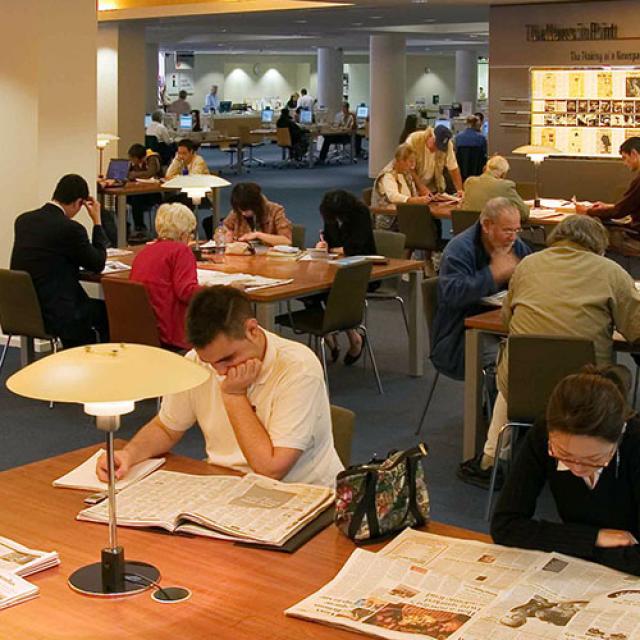 Using our collection materials, view of customers in the reading area.