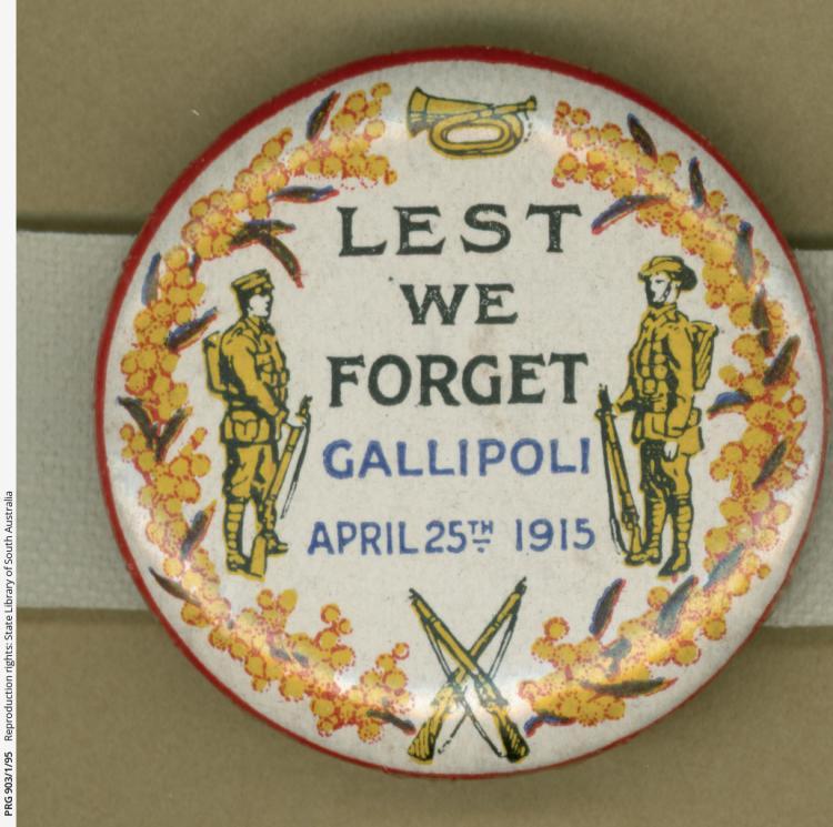 WWW1 badge - Lest we forget  - showing wattle and miltary personnel 