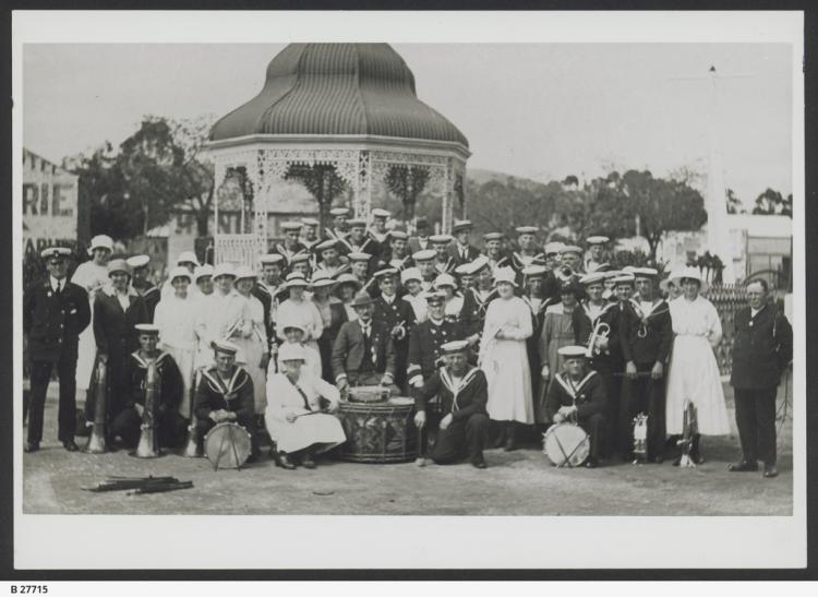 Naval Band with group of men and women in front of bandstand at Burra-1915 