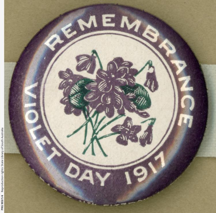 WW1 badge- Violet Day - 1917 showing bunch of violets and word Remembrance 