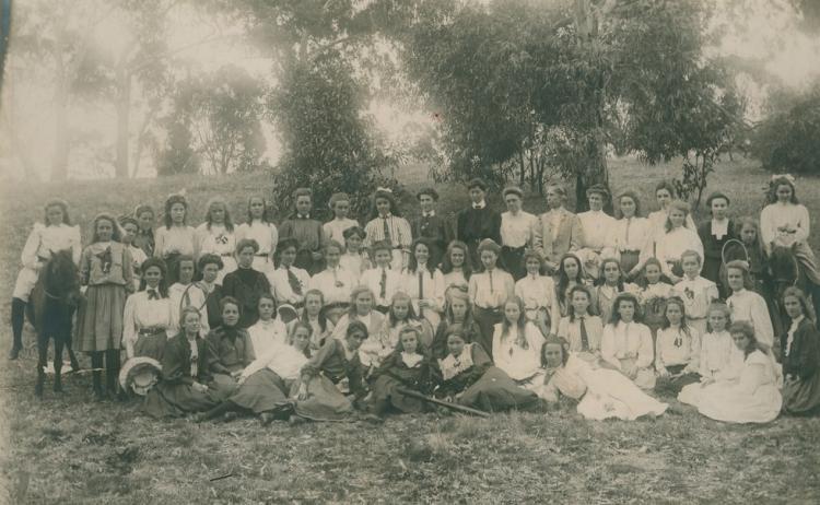 Last cohort of Advanced School for girls showing students and teachers in outdoor setting, c 1910. SLSA: B 25677/39